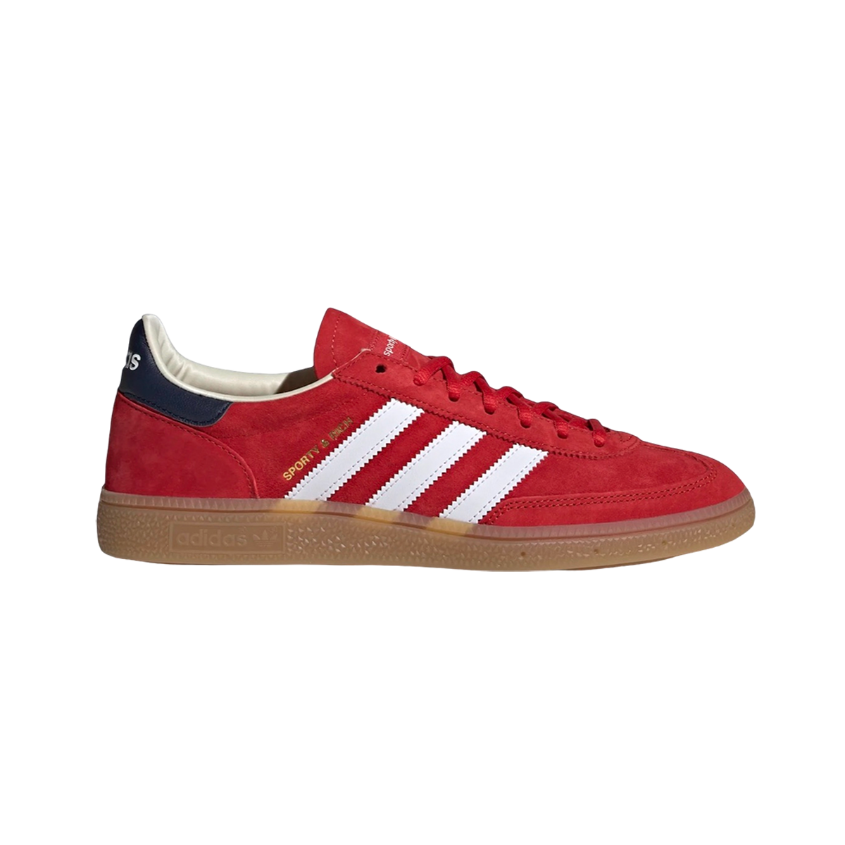 Adidas Handball Spezial Sporty & Rich USA – limited edition unisex low-top sneakers featuring white leather upper with red and blue USA flag-inspired accents, premium suede overlays, classic handball silhouette, gum rubber outsole for enhanced grip and durability, breathable perforations, exclusive collaboration with Sporty & Rich, ideal for streetwear and casual fashion