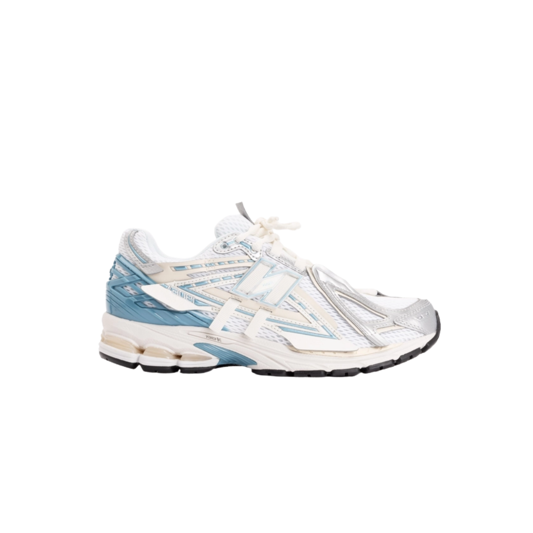 New Balance 1906A sneakers in Sea Salt with mesh upper and sculpted TPU heel cage