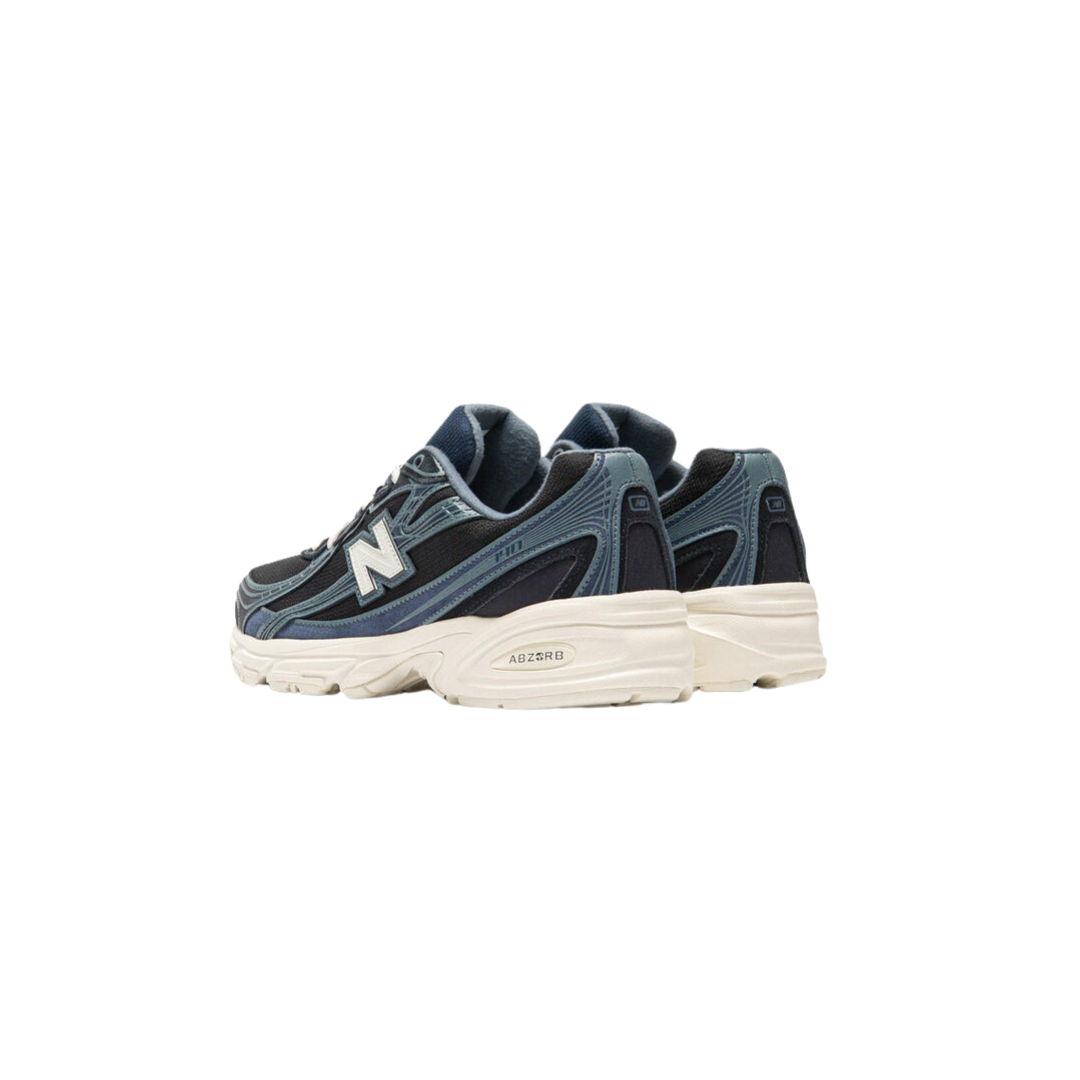 New Balance 740 sneakers in Dark Night Sea Salt with open-knit mesh upper