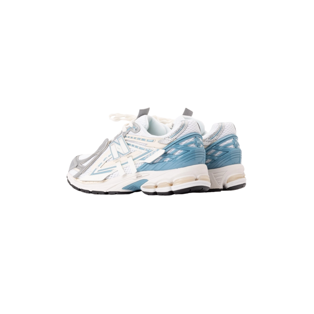 New Balance 1906A sneakers in Sea Salt with mesh upper and sculpted TPU heel cage