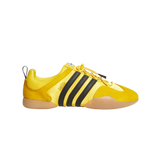 Adidas Ballerina Bad Bunny Bold Gold – limited edition unisex low-top sneakers featuring bold gold leather upper with black accents, exclusive Bad Bunny branding, gum rubber outsole for enhanced traction, sleek streetwear design combining luxury and urban style, perfect for collectors and fashion-forward sneaker fans