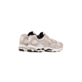 Mizuno Wave Rider 10 sneakers in Beige with retro running-inspired design