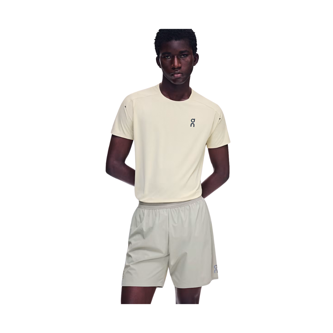 On Running M 7-inch Performance Shorts in Brume with inner brief and zipped back pocket