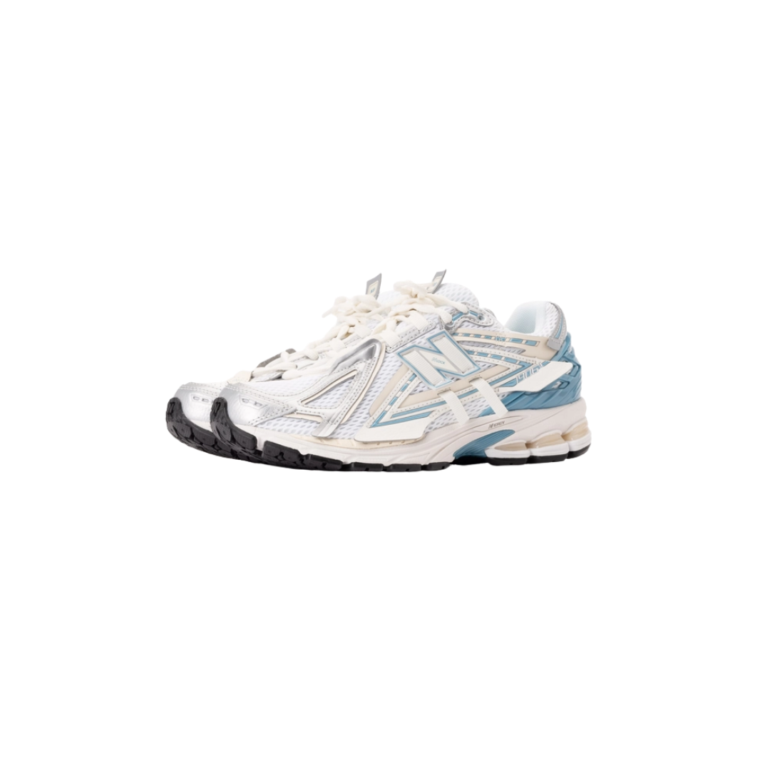 New Balance 1906A sneakers in Sea Salt with mesh upper and sculpted TPU heel cage