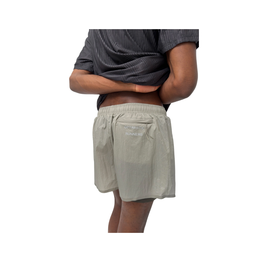 Optimistic Runners Layered Shorts AW26 in Grey for running and training