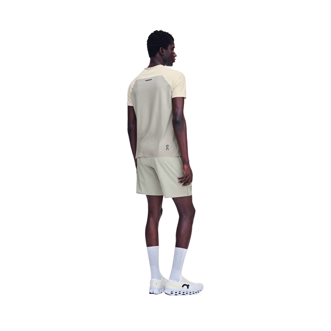 On Running M 7-inch Performance Shorts in Brume with inner brief and zipped back pocket
